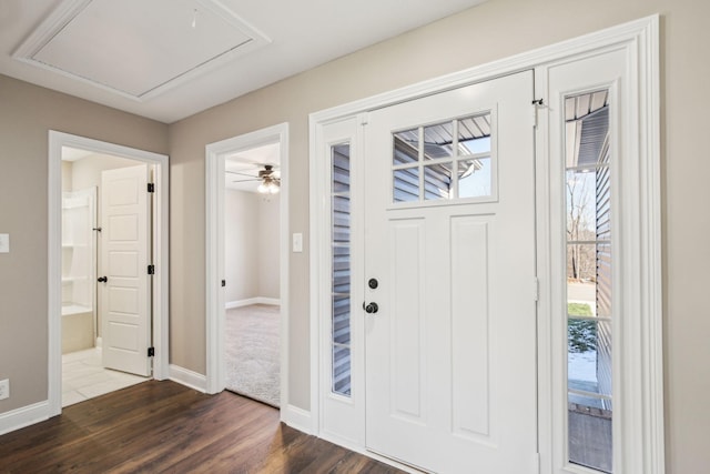 foyer entrance featuring ceiling fan and dark hardwood / wood-style flooring