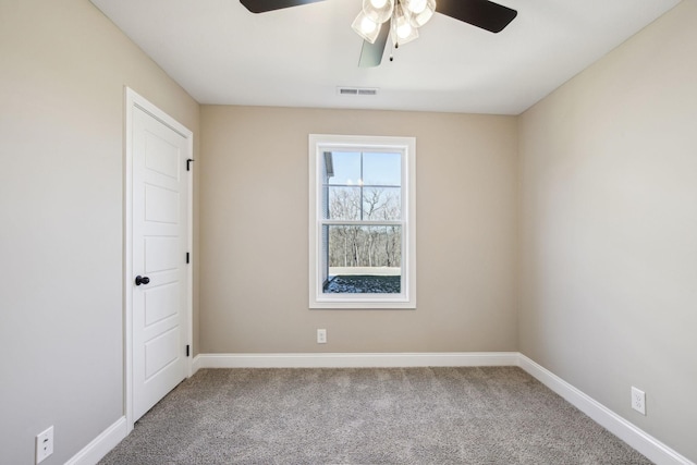 carpeted empty room with ceiling fan