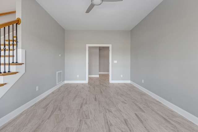 empty room featuring ceiling fan