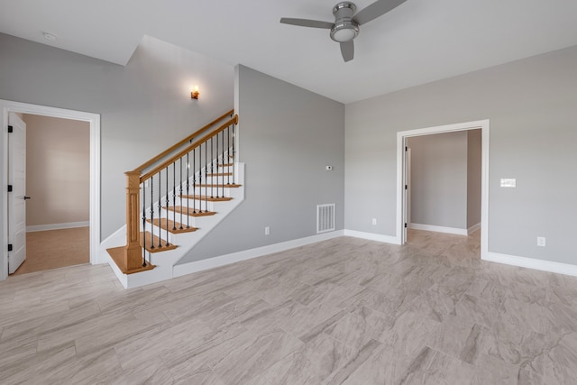 unfurnished room featuring ceiling fan