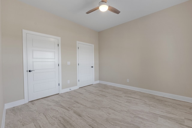 empty room featuring ceiling fan