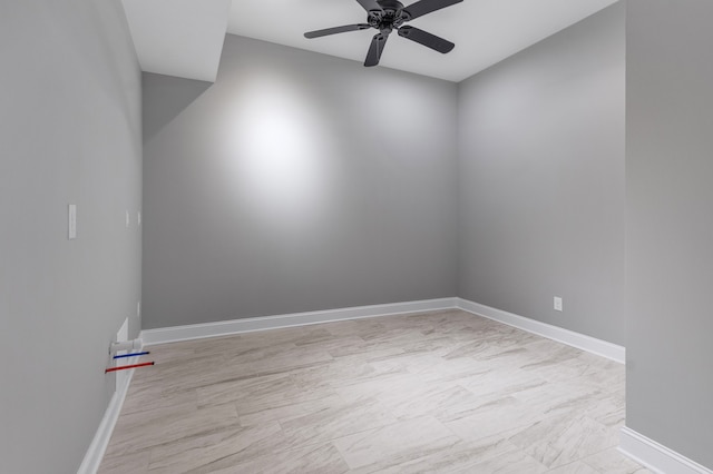 spare room with ceiling fan