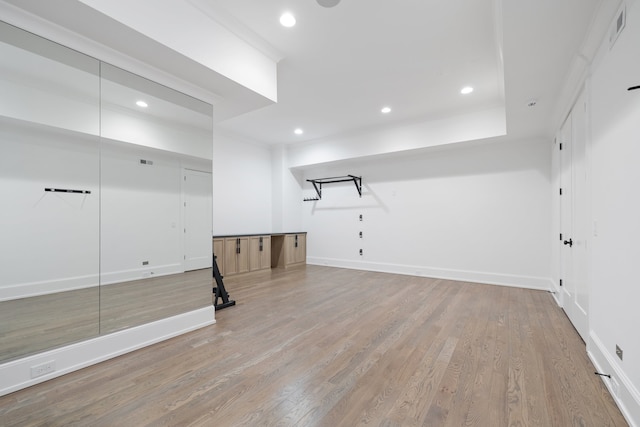 basement featuring light hardwood / wood-style flooring