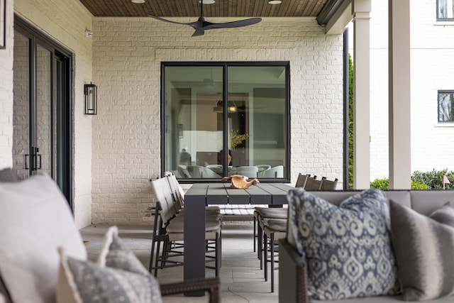 view of patio / terrace with ceiling fan and an outdoor hangout area