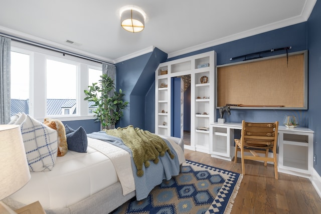 bedroom featuring dark hardwood / wood-style flooring and crown molding