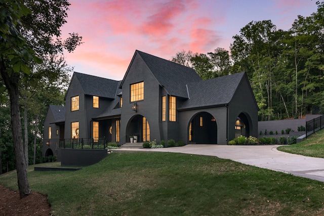 view of front of property with a yard