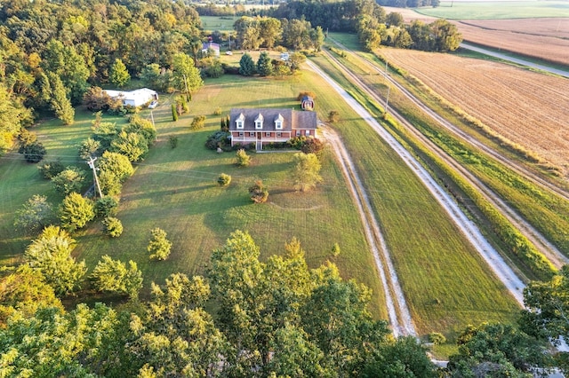 birds eye view of property with a rural view