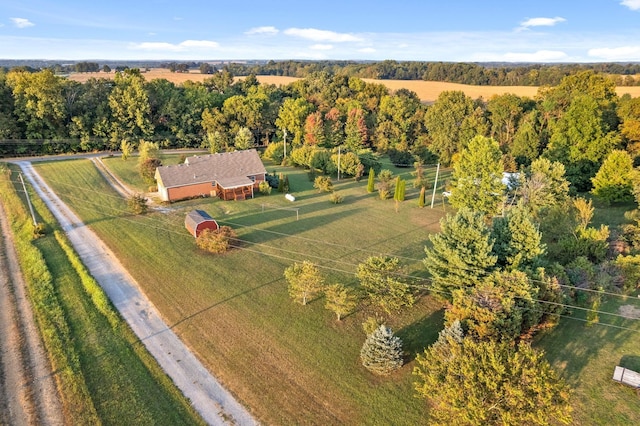 birds eye view of property featuring a rural view