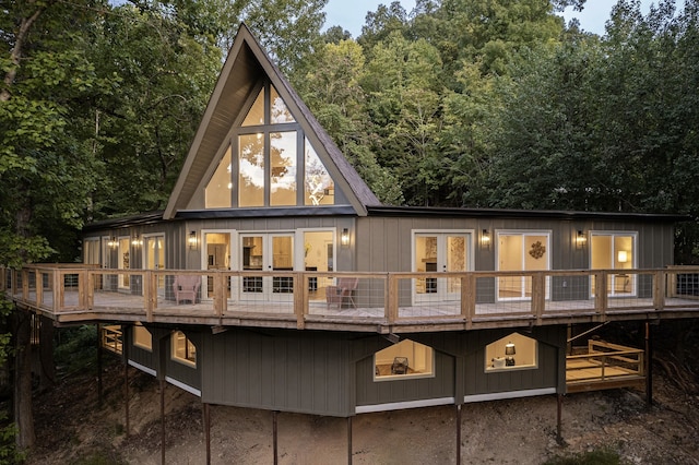 rear view of house with a deck