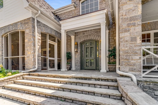 property entrance with covered porch