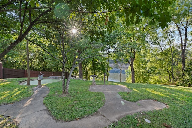 view of home's community featuring a lawn