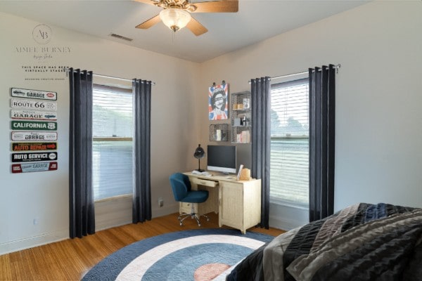 bedroom featuring light hardwood / wood-style flooring and ceiling fan