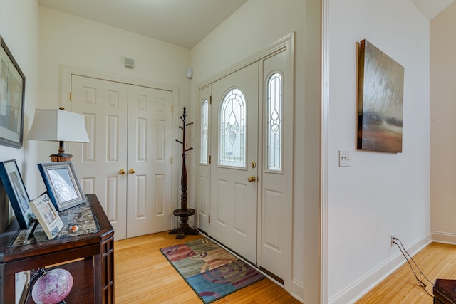 foyer with light wood-type flooring