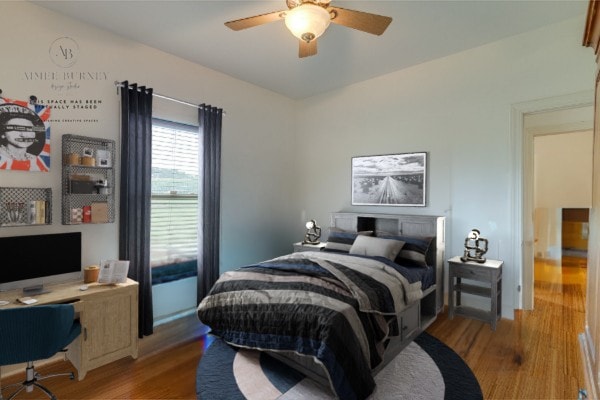 bedroom with wood-type flooring and ceiling fan