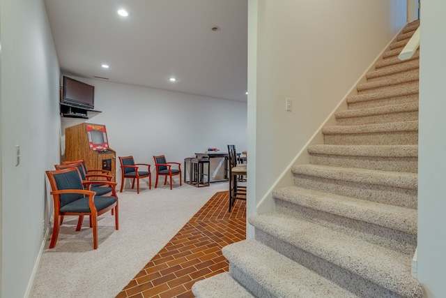 stairway with carpet flooring