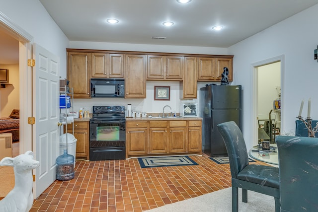 kitchen with black appliances