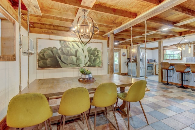 dining area with a notable chandelier and wooden ceiling