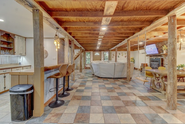 unfurnished living room featuring indoor bar