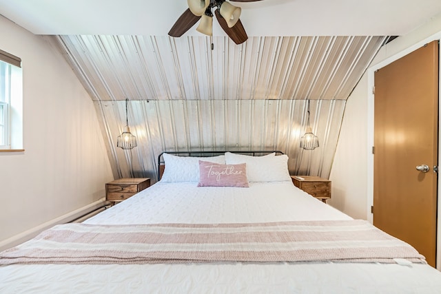 bedroom featuring ceiling fan and vaulted ceiling