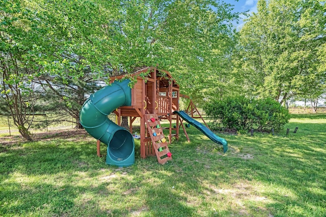 view of playground with a yard