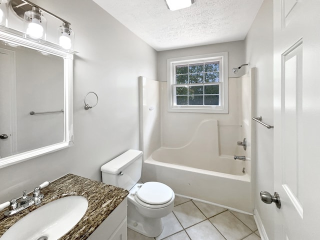 full bathroom with tile patterned floors, toilet, tub / shower combination, vanity, and a textured ceiling