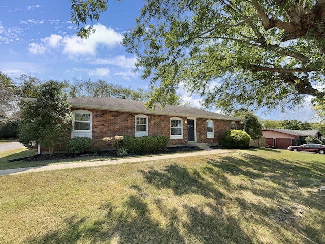 ranch-style home with a front lawn