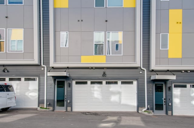 view of property featuring a garage