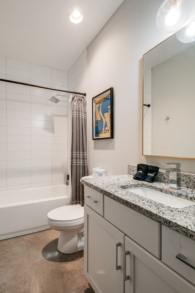 full bathroom featuring shower / bath combination with curtain, toilet, and vanity