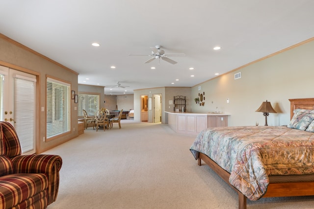 bedroom featuring light carpet, ornamental molding, access to exterior, and ceiling fan