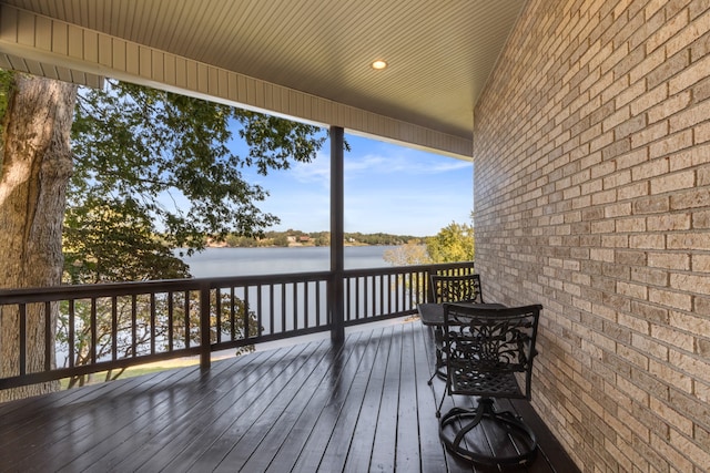 deck featuring a water view