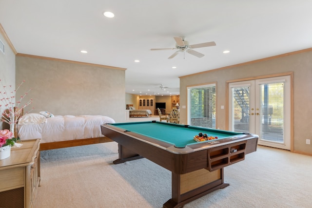 game room featuring billiards, french doors, crown molding, light colored carpet, and ceiling fan