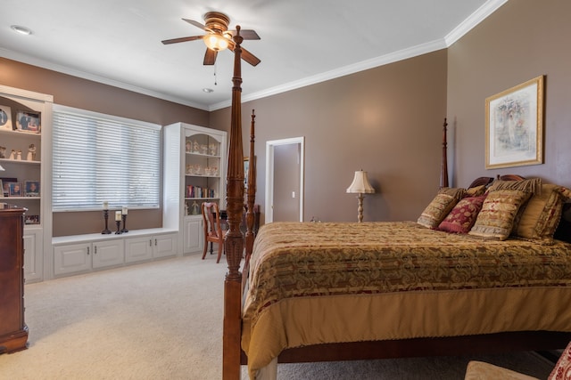 bedroom with crown molding, light colored carpet, and ceiling fan