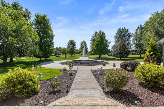 surrounding community featuring a lawn