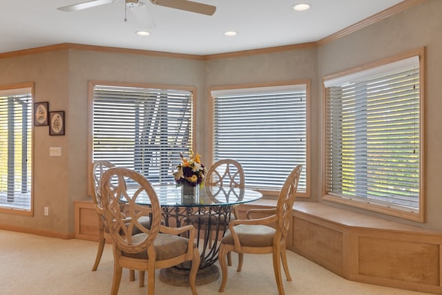 dining area with plenty of natural light, ceiling fan, and ornamental molding