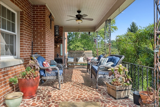 view of patio / terrace with ceiling fan and outdoor lounge area