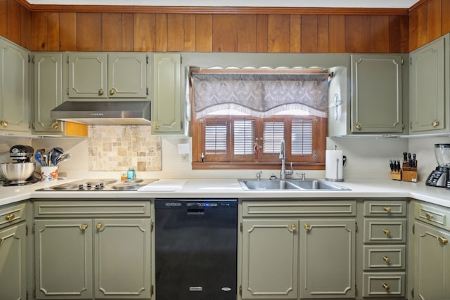 kitchen featuring cooktop, black dishwasher, and sink