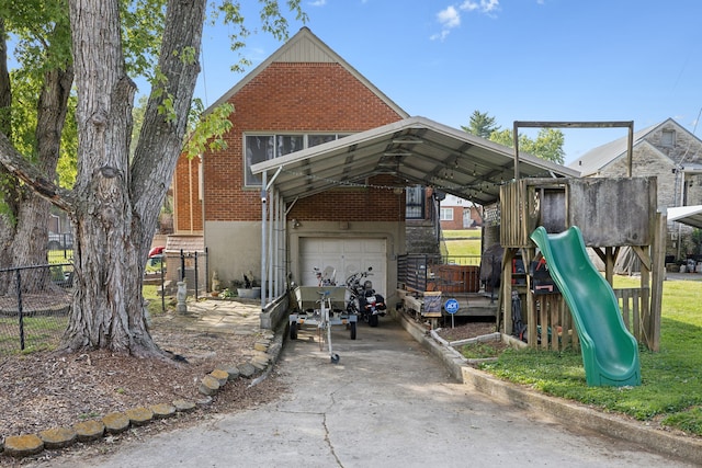 exterior space featuring a garage and a carport