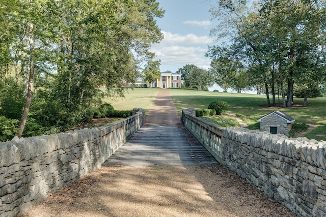 surrounding community featuring a lawn