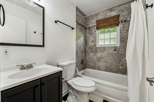 full bathroom with vanity, toilet, and shower / bath combo with shower curtain