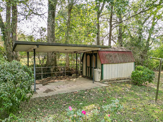 view of outbuilding with a carport