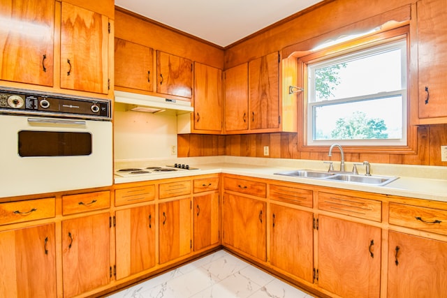 kitchen with white appliances and sink