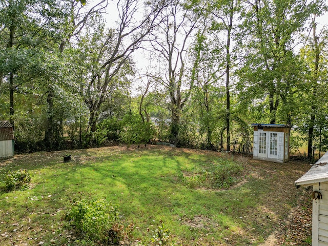 view of yard featuring french doors