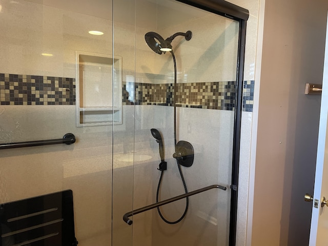 details featuring a shower with door