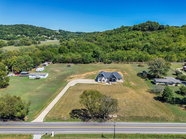 birds eye view of property featuring a rural view