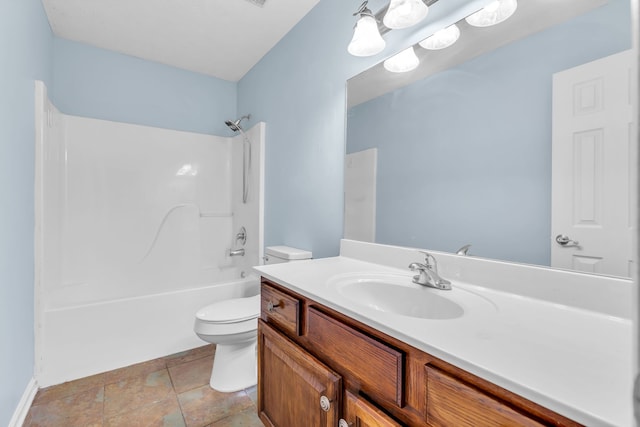 full bathroom with vanity, toilet, and shower / washtub combination