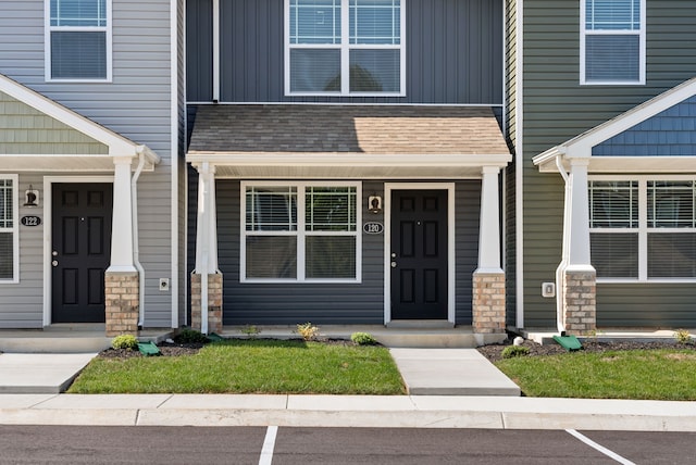 doorway to property featuring a porch