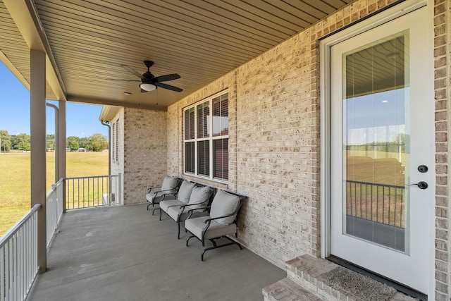 view of patio / terrace featuring ceiling fan