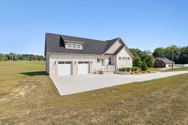 craftsman inspired home featuring a front yard and a garage