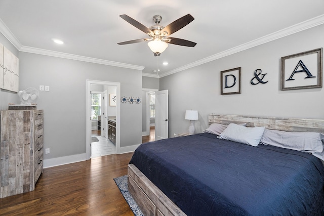 bedroom with dark wood-type flooring, ceiling fan, crown molding, and ensuite bath