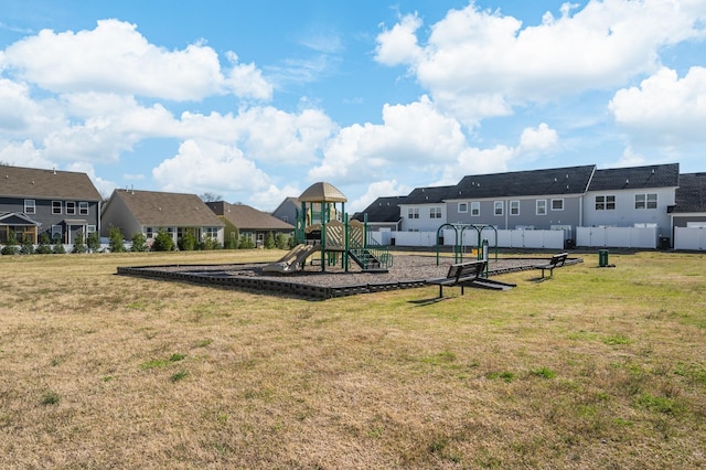 view of playground featuring a lawn